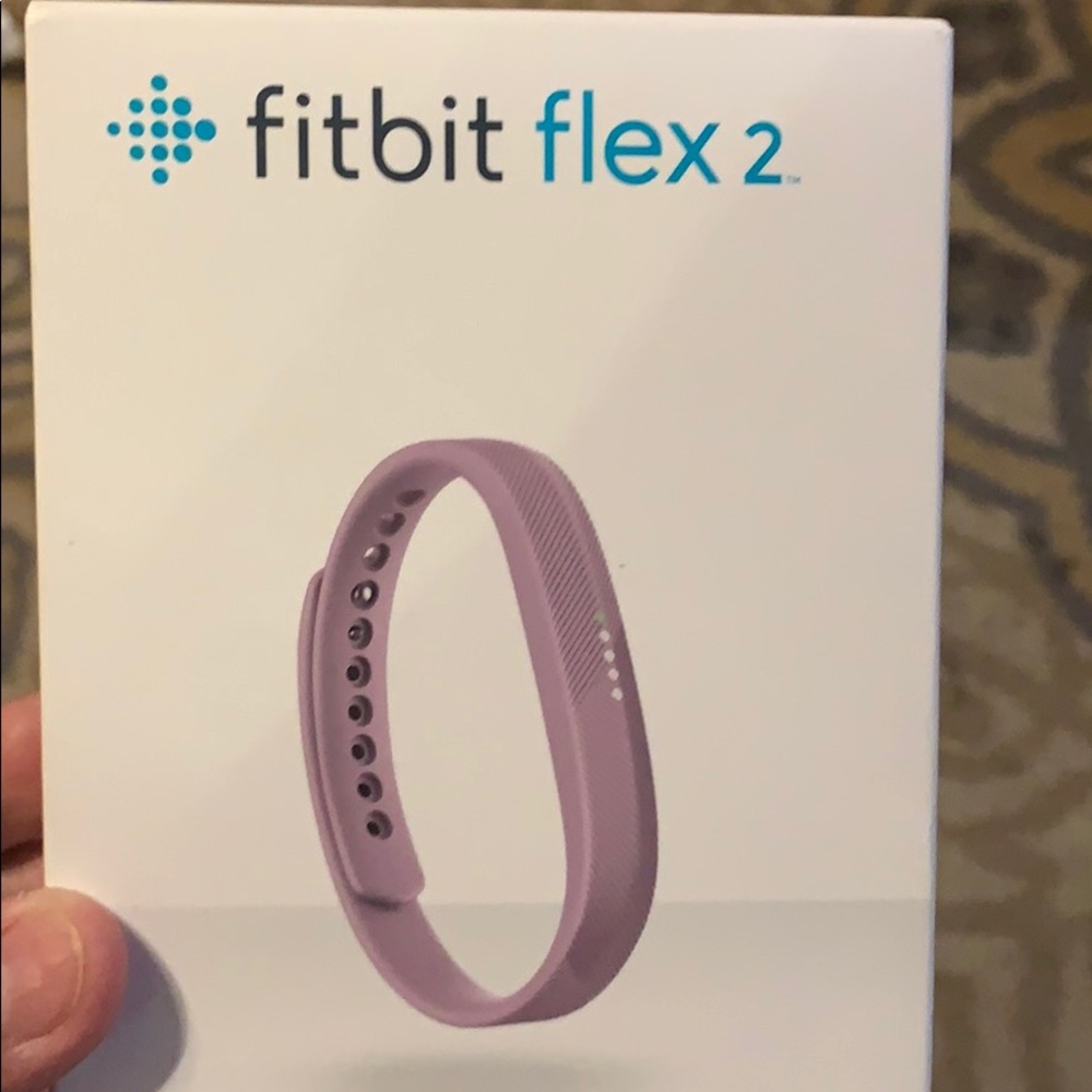 Fitbit flex2. New in box. Lavender band.